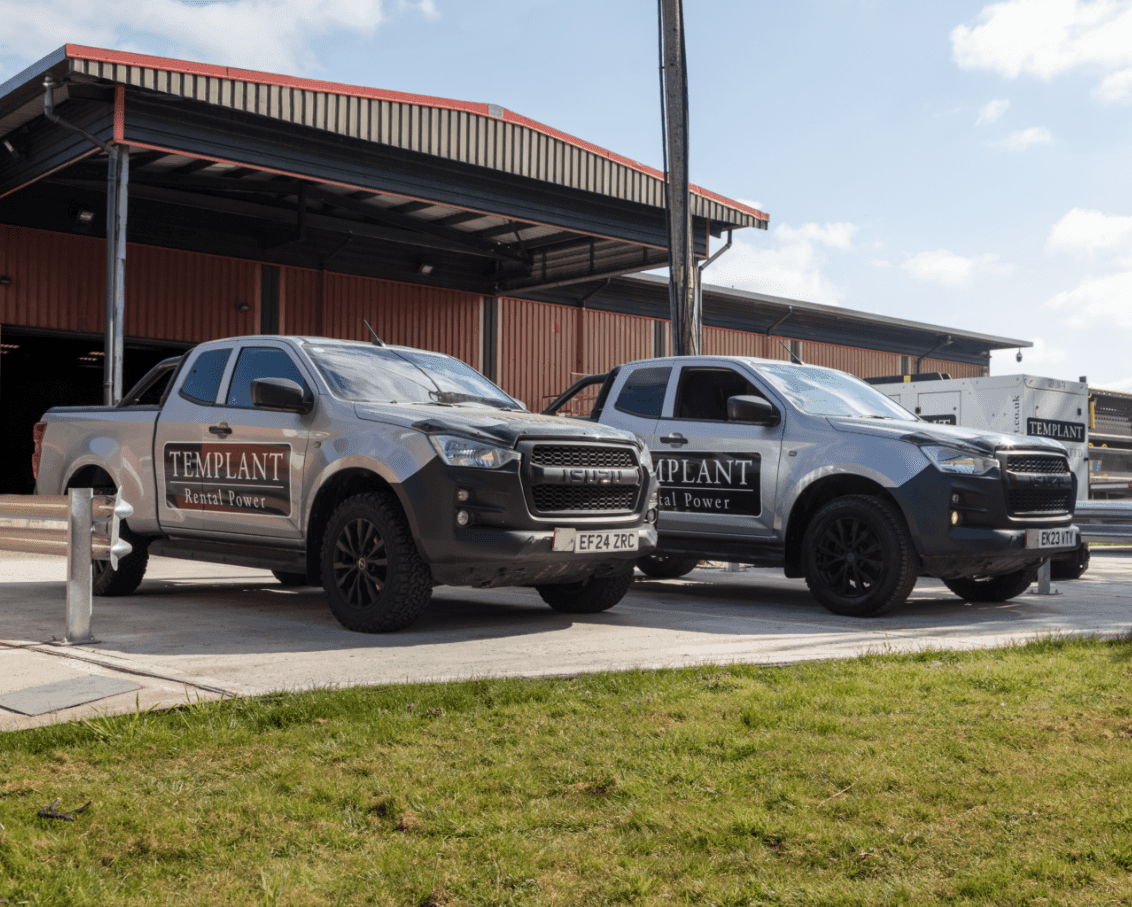 Two pickup trucks used for generator deliveries to restricted or emergency access areas